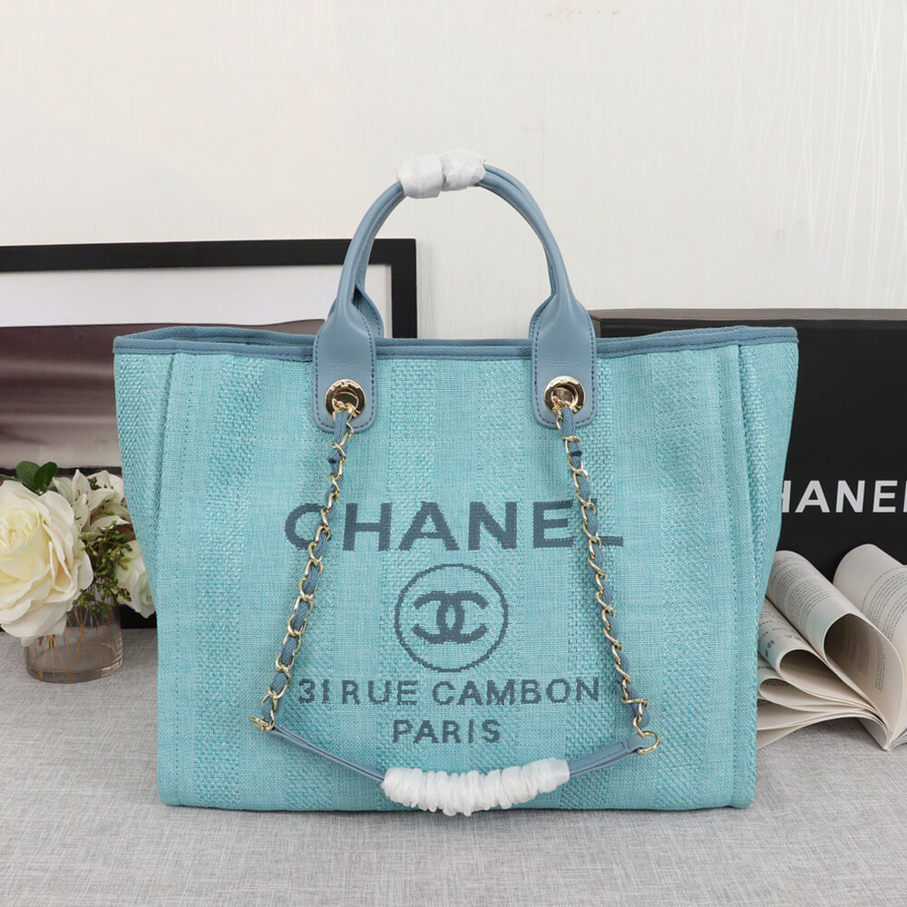 Ch*el woven straw raffia striped medium deauville tote