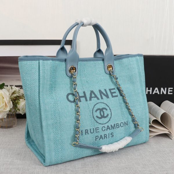 Ch*el woven straw raffia striped medium deauville tote